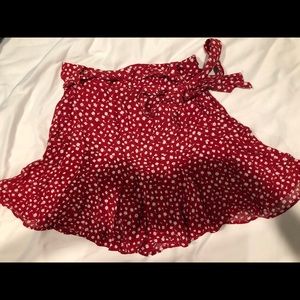 red floral miniskirt